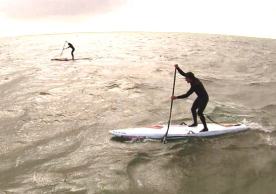Cold water SUP-wetsuit, leash and some people nearby! 