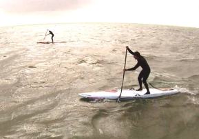 Cold water SUP-wetsuit, leash and some people nearby! 